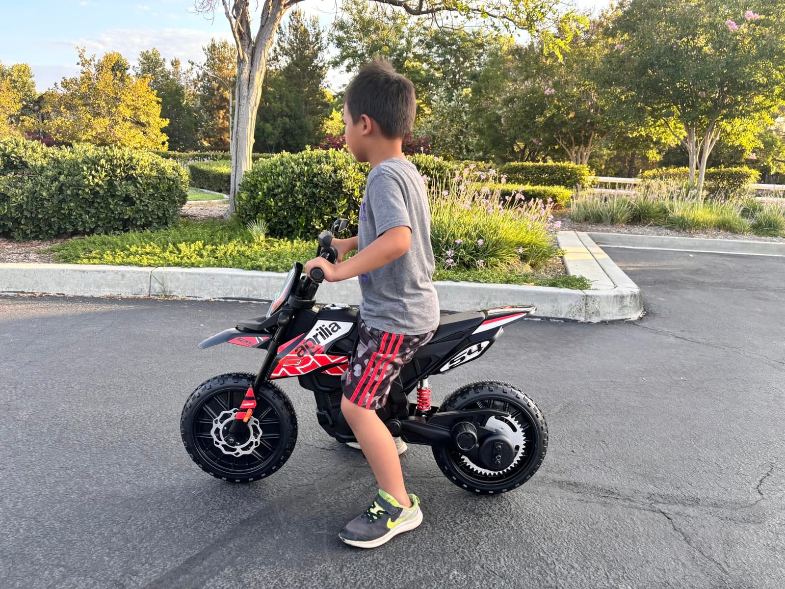 OLAKIDS Kids Motorcycle, Licensed Aprilia RX125 12V Ride on Electric Dirt Bike Motorbike with Training Wheels, Spring Suspension, Bluetooth, USB, Lights customer photo 2